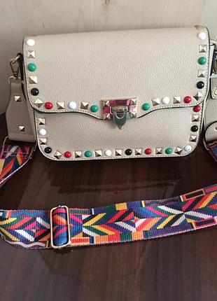 Сумка з орнаментами поясом