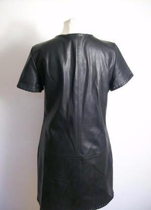 Платье из кожзама, трапециевидное, с v-образным вырезом с окантовкой № 1102 фото
