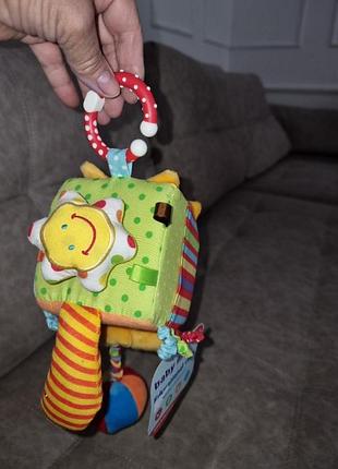 Подвесная игрушка на коляску