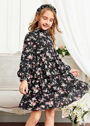 Дуже гарна сукня,  в квітковий принт, приблизно 10-12 років. стан ідеальний.