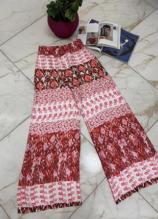 Жіночі шовкові брюки палаццо