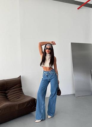 Жіночі джинси палаццо з асиметричним поясом