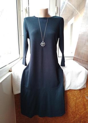 Брендовое трикотажное платье миди