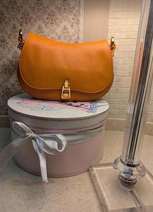 Кожаная сумка coccinelle magie mini