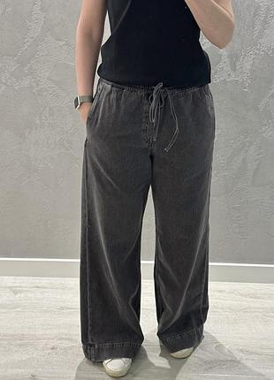 Джинси cos