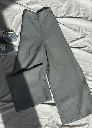 Широкі костюмні кюлоти штани