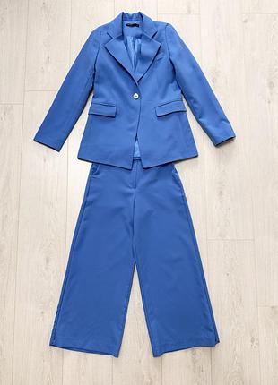 Костюм для дівчинки 128 зріст