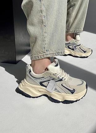 Жіночі текстильні масивні кросівки