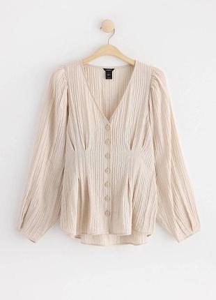 Блуза з широкими рукавами