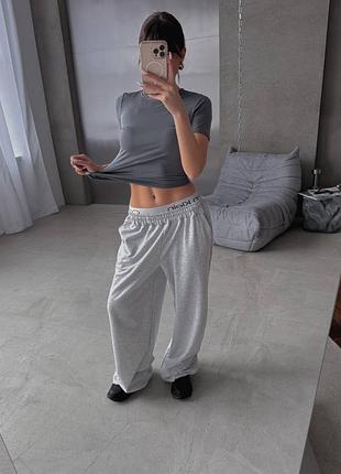 Стильні штани палаццо з лого