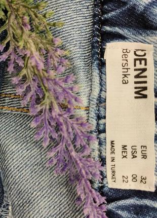 Рваные джинсы на манжете2 фото