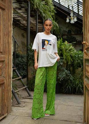 20904 зеленых брюк из кружева