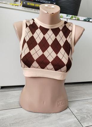 Коротка жилетка рубчик в'язка