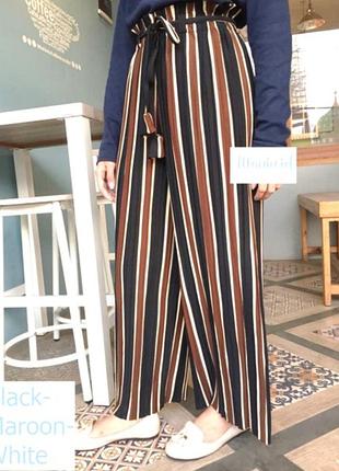 Штани брюки в смужку