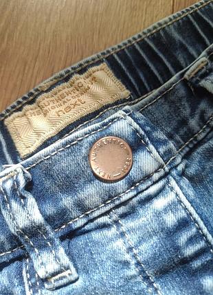 Джинсы скошенные эластичные next 140см 6