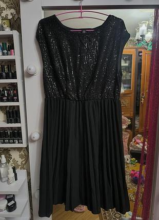 Гарна святкова вечірня блискуча сукня в паєтках плісе без рукавів