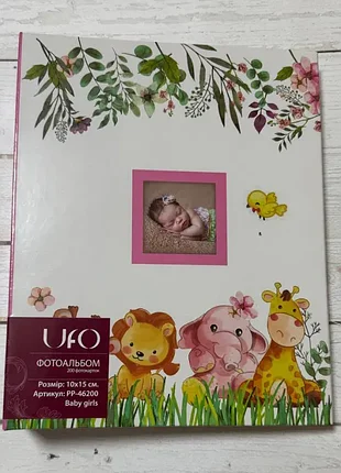 Фотоальбом для 200 фотографий размером 10*15 см с файлами и картонной обложкой.