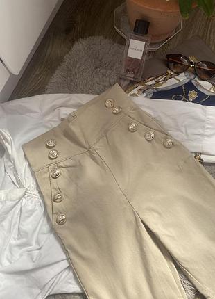 Лосіни бежеві з золотими трендовими гудзиками