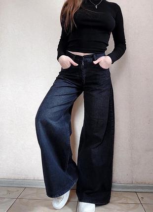 Джинси труби широкі