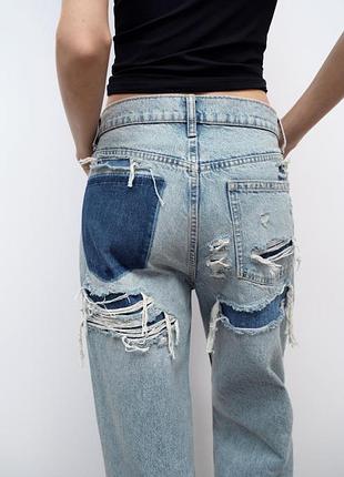 Джинси zara з ефектом потертості на стегнах