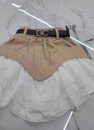 Міні спідниця для дівчинки підлітка