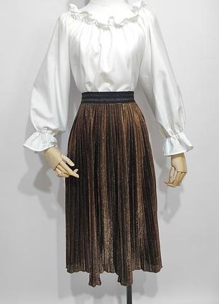 Плісирована золотиста спідниця
