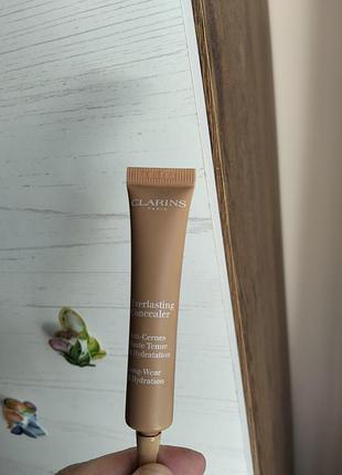 Консилер clarins