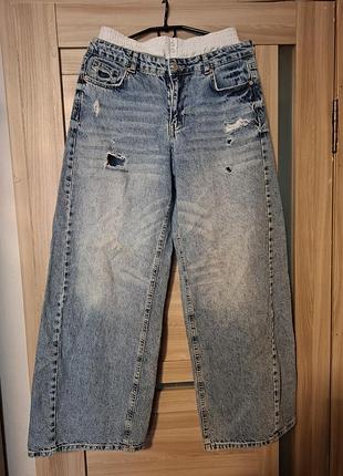 Широкие джинсы клеш