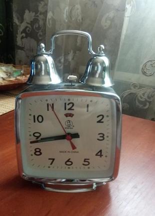 Новый будильник в упаковке.