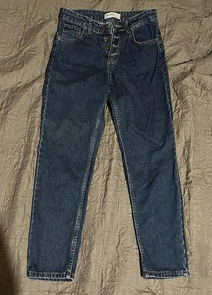 Сині джинси на ґудзиках