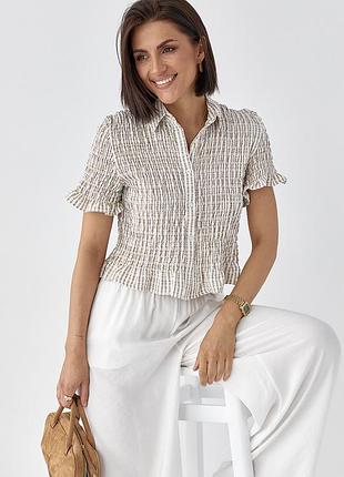 Смугаста блуза з ефектом жатки