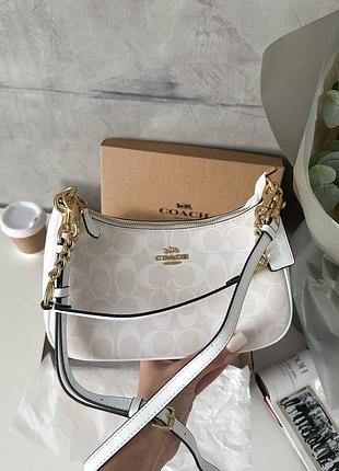 Шкіряна біла жіноча сумка коач coach teri