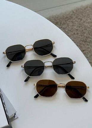Солнцезащитные очки женские и мужские