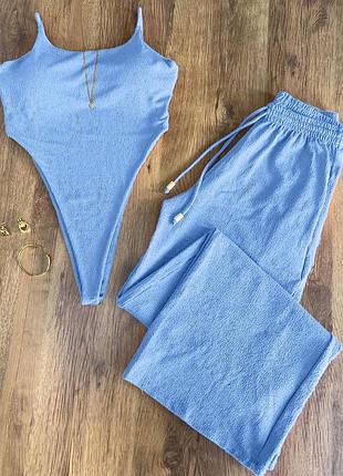 Жіночий блакитний костюм боді і палаццо жатка