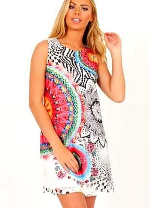 Стильна жіноча сукня-сітка