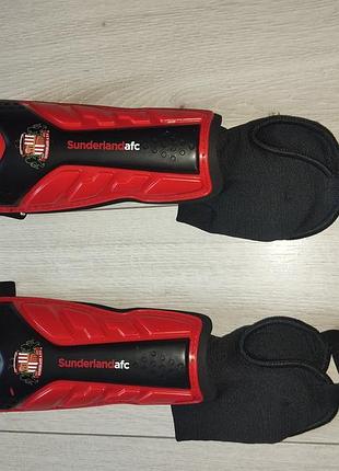 Щитки футбольні