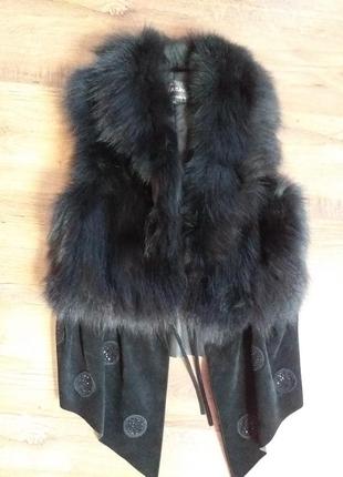 Жилетка в наявності