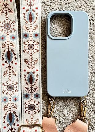 Блакитний чохол з етно ремінцем на iphone 15 pro