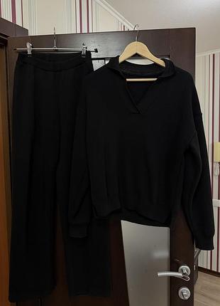 Костюм зі штанами кльош