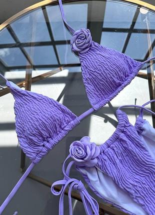 Роздільний жіночий купальник жатка з об'ємними квітами blossom бузковий3 фото