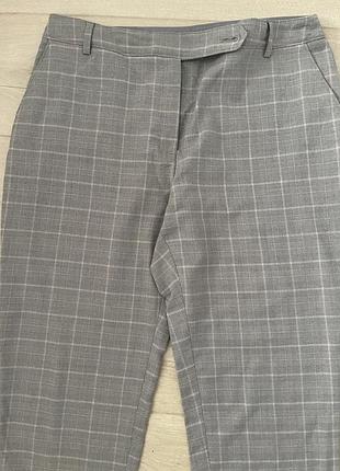Штани в клітинку