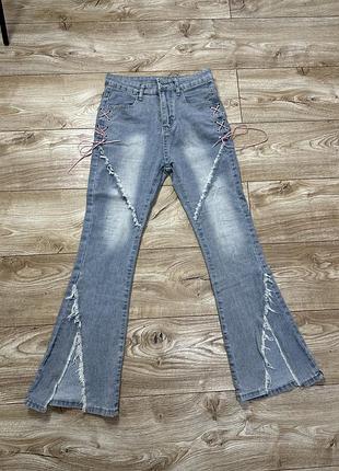 Джинси кльош