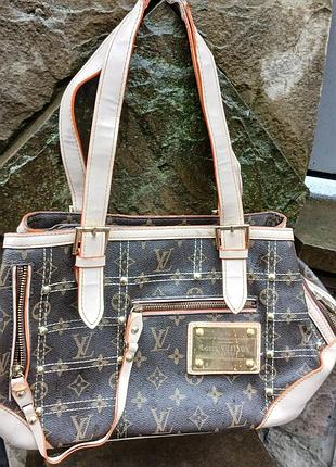Женская сумка louis vuitton.