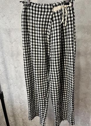 Штани широкі в клітинку