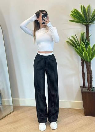 Жіночі чорні штани з подвійним поясом в полоску