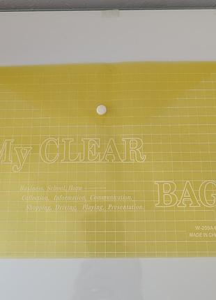 Жовта пластикова папка на кнопці, формат а4