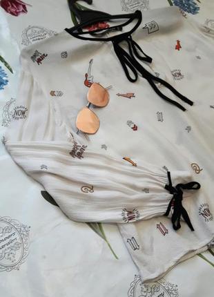 Легка молочна блуза з принтом на зав'язках від zara10 фото