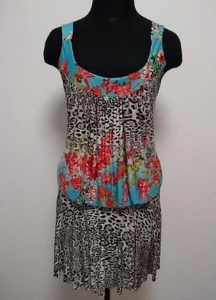 Сарафан платье без рукавов в цветочек из очень тонкой приятной к телу ткани.