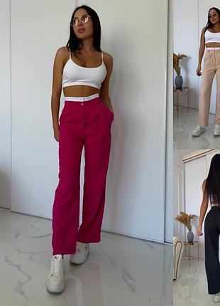 Брюки з білим поясом