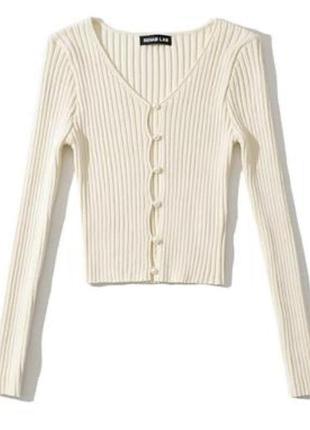 Вкорочена ковтинка молочного кольору на ґудзиках в розмірі s